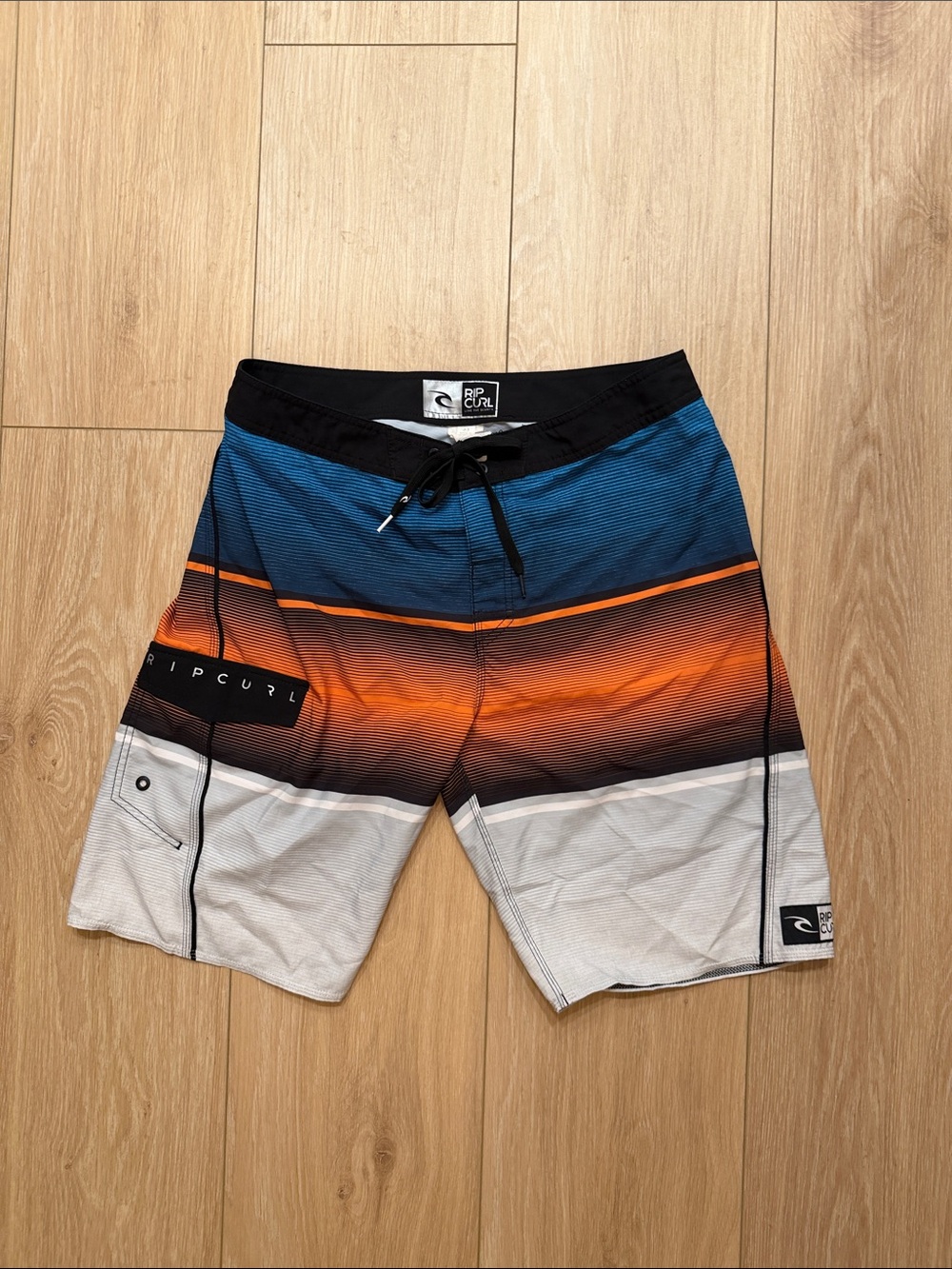 Rip Curl Men’s Blue Orange White Gradient Board Shorts